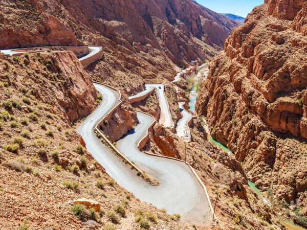 a winding road in a rocky canyon