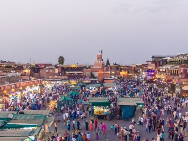 a large crowd of people in a square