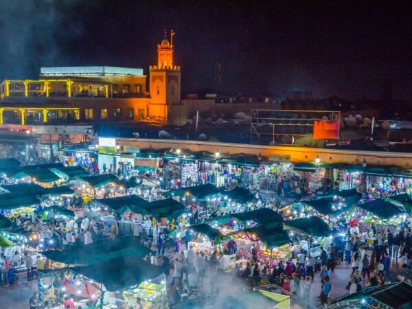 a crowd of people at a market