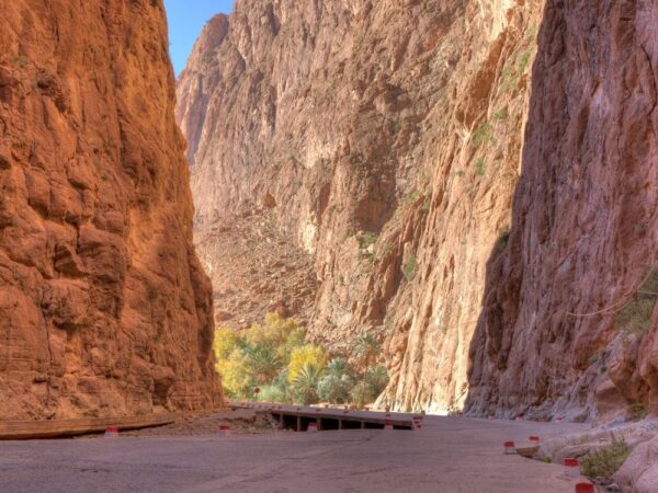 a road between large rocks