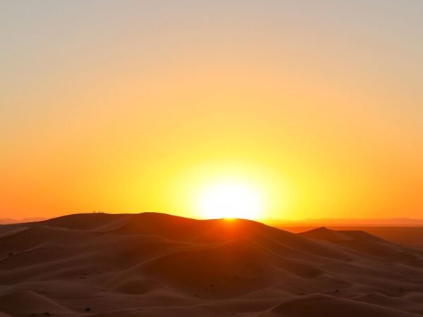 a sunset over a desert