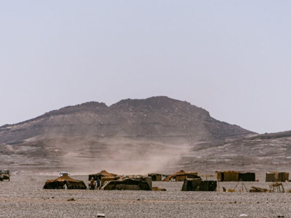 a group of tents in a desert