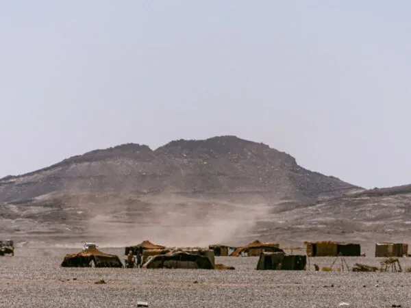 a group of tents in a desert
