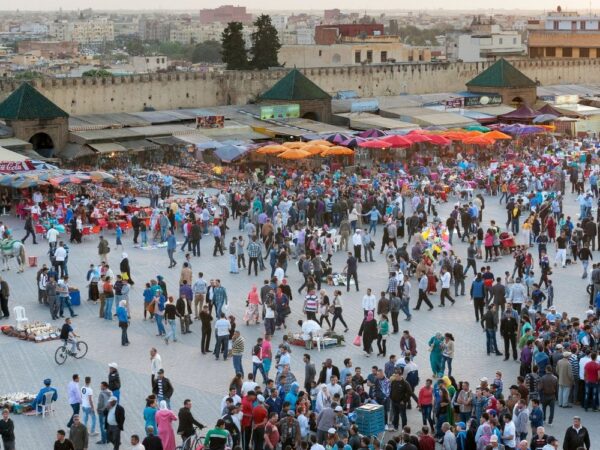 a large crowd of people in a city