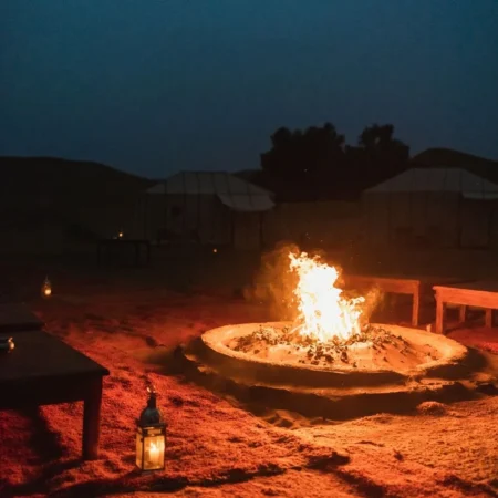 Merzouga luxury desert tent with fire camp night